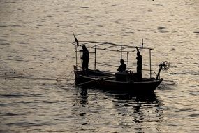 Fishers in a boat