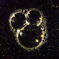 Mickey Mouse head form from soap Bubbles