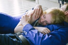 hugging couple on floor