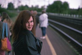 photo of a young girl at the train station