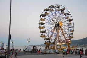 ferris wheel on the promenade at sunset