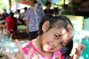 cute smiling girl in pink