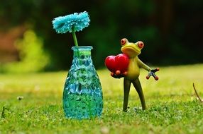frog with flower for the holiday of saint valentine