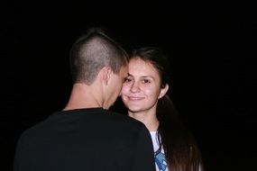 romantic couple on a dark night background