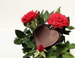 chokolate heart in the roses bouquet