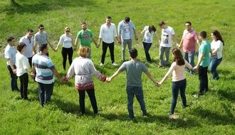 friends in a circle on nature