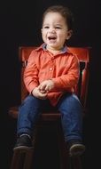 portrait of a cute sitting boy