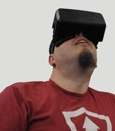 Virtual Reality Device in front of a man with a beard