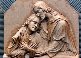 Jesus Christ hugging Child, bronze relief