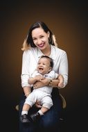 Laughing mother with child