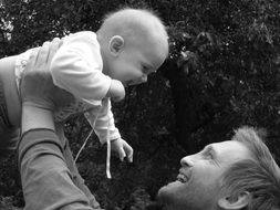 Photo of happy father and daughter