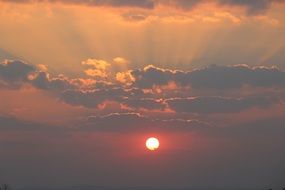 beautiful Sunset sun beams at sky