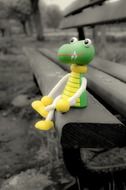 toy crocodile on the bench