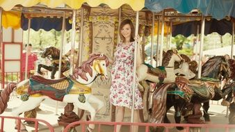 Girl On Carousel