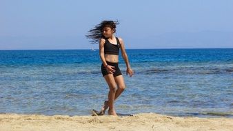 joyful girl on the beach