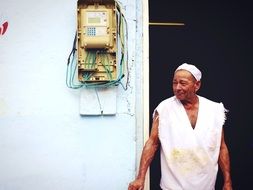 hardworking person at the exit of a building in Cuba