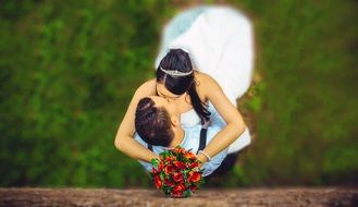 kissing wedding pair