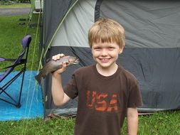 Happy Boy With Fish
