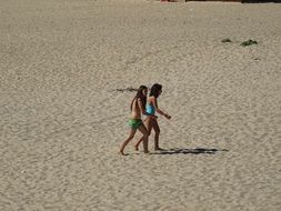 Children are playing on the beach