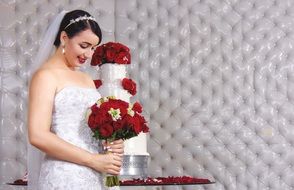 happy bride with red bouquet