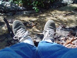 photo of legs in hiking shoes