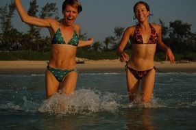 Having fun girls on a beach