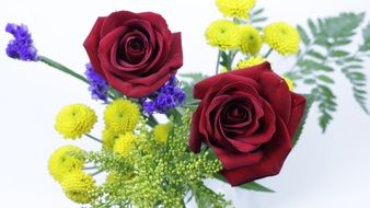 bouquet with red roses and yellow flowers