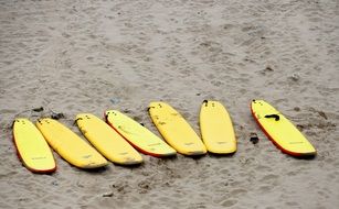 Yellow Surf Boards on a beach