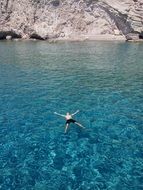 man relaxes in the water