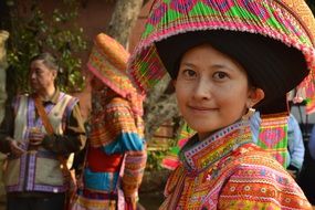 people in colorful traditional costumes in thailand