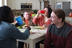 talking friends at the table