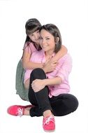 Mother with the daughter on the white background