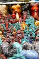 colored Buddha and elephant figures