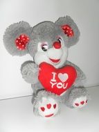 soft mouse with a red heart as a symbol of love