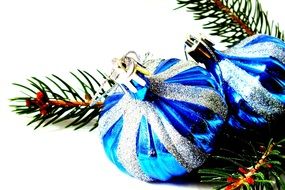 blue Christmas baubles and fir tree branch