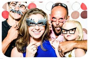 photo of friends with masks at a party