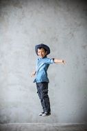 Photo of happy jumping child