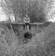 Guy Sitting monochrome photo