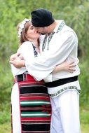 couple in traditional costumes in Romania