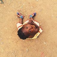 photo of an african child on top