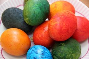 Easter colorful eggs in a plate