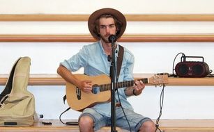 Musician in a blue clothes