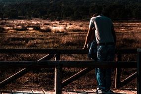 couple in love on a small wooden bridge