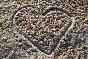 heart drawn in sand