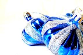 blue Christmas baubles on the white background