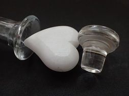 white heart near a glass carafe