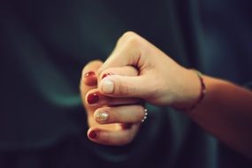 two girls hold hands