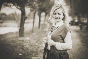 blonde in the park in black and white background