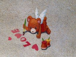 winged teddy bear and Love inscription, Painting on Wall