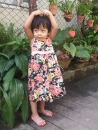 cute little girl in a colorful dress